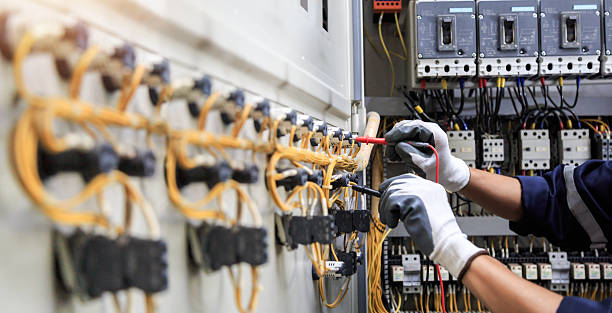 Professional Electrician technician working in Green Forest, AR